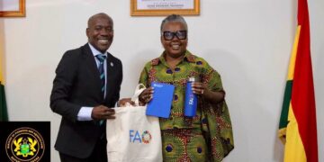 Hon. Emelia Arthur, Minister for Fisheries and Aquaculture together in a Photograph with United Nations FAO Repsentative, Meshack Oguna Malo