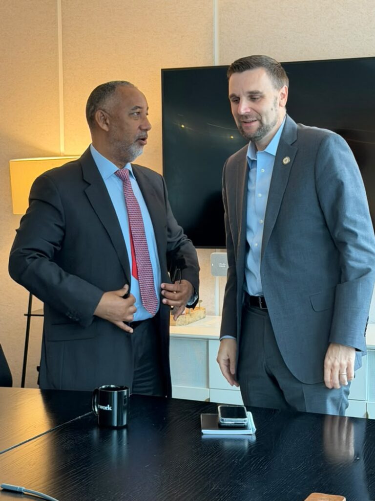 Chief Executive Officer of the Millennium Development Authority (MiDA), Mr. Alex Mould, shaking hands with senior official of the MCC in New York 