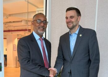 MCC Reopens Ghana Compact Talks as Energy Returns to Agenda 3 Chief Executive Officer of the Millennium Development Authority (MiDA), Mr. Alex Mould, shaking hands with senior official of the MCC in New York