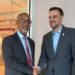 Chief Executive Officer of the Millennium Development Authority (MiDA), Mr. Alex Mould, shaking hands with senior official of the MCC in New York