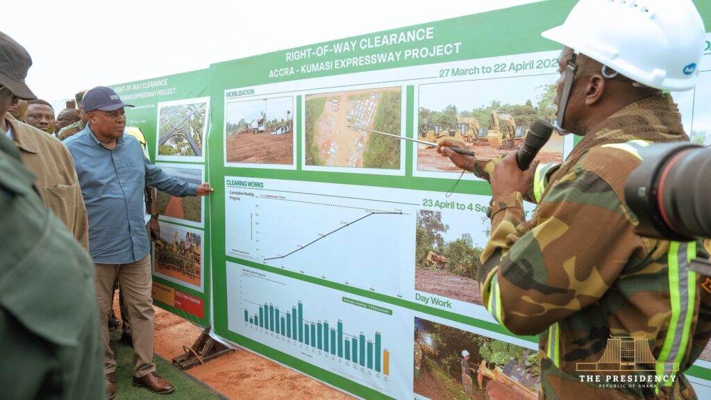 Ghana Armed Forces officer briefing President Mahama on Accra-Kumasi Expressway clearing works