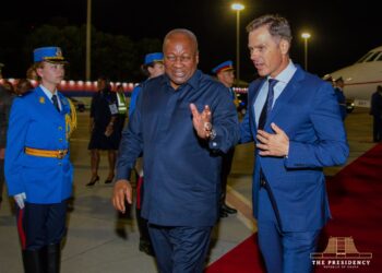 President Mahama walks with his Serbian host along the tarmac after touchdown in Belgrade for the two-day NAM commemoration.