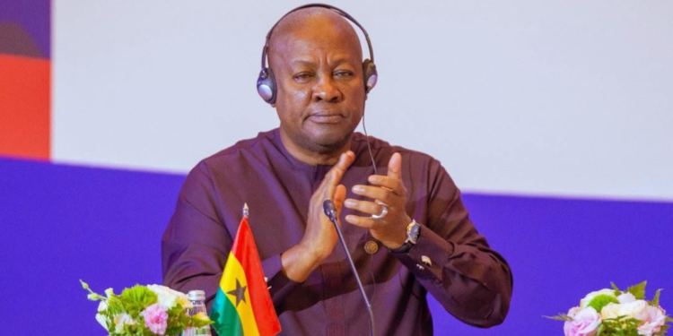 Mahama Demands End to Cuba Embargo, Justice for Sudan and Gaza 1 Mahama follows proceedings through headphones during the summit, marking Ghana's continued place among the Non-Aligned Movement's founding members.