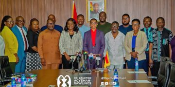Dr Zanetor Agyeman-Rawlings poses with Armah-Kofi Buah and staff of the Ministry of Environment, Science and Technology following the handover ceremony