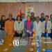 Dr Zanetor Agyeman-Rawlings poses with Armah-Kofi Buah and staff of the Ministry of Environment, Science and Technology following the handover ceremony