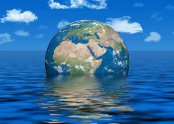 World Leaders Confront Rising Seas Amid Climate Change Threat 3 Earth partially submerged in a vast ocean symbolizing rising sea level