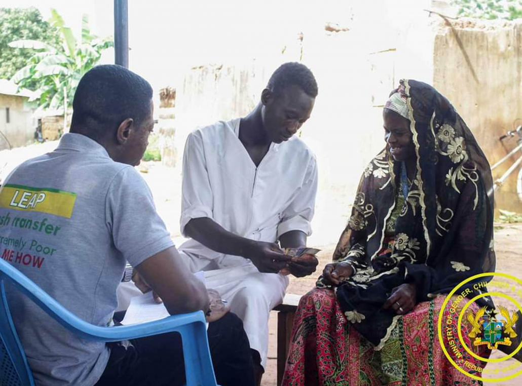 LEAP beneficiary receiving cash transfer support in Ghana