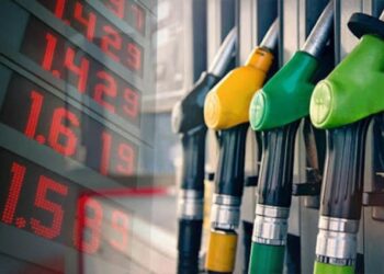 Fuel nozzles and price display illustrating rising fuel price pressures in Ghana