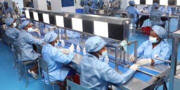 Workers on a pharmaceutical production line in Ghana