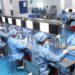Pooled Procurement Could Scale Ghana's Pharmaceutical Industry 14 Workers on a pharmaceutical production line in Ghana