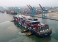 Container vessel carrying imports and exports at Tema Port Ghana