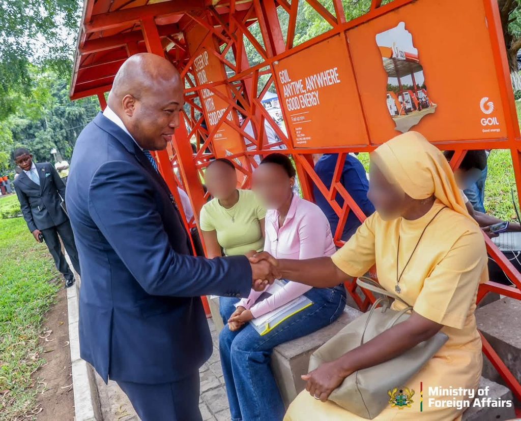 Protect Ghanaians' Dignity At Visa Centres, Ablakwa Tells Embassies 3 Foreign Affairs Minister Samuel Okudzeto Ablakwa greets applicants waiting at an outdoor shelter during his working tour of more than 20 embassies and visa application centres. He said the visit let him hear their experiences at first hand. Photo: Ministry of Foreign Affairs