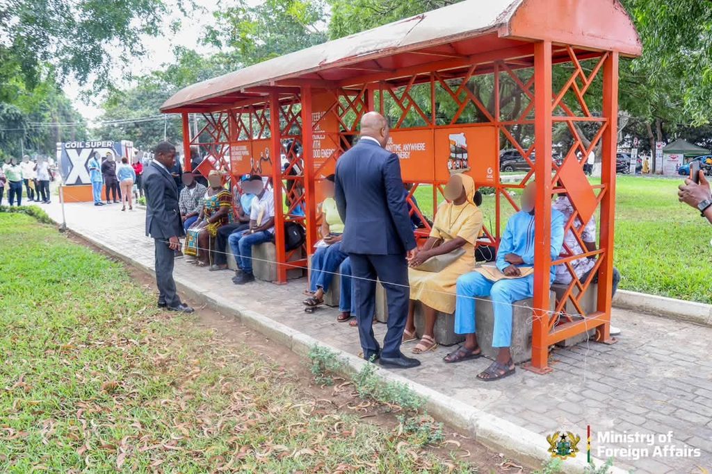 Protect Ghanaians' Dignity At Visa Centres, Ablakwa Tells Embassies 4 Foreign Affairs Minister Samuel Okudzeto Ablakwa greets applicants waiting at an outdoor shelter during his working tour of more than 20 embassies and visa application centres. He said the visit let him hear their experiences at first hand. Photo: Ministry of Foreign Affairs