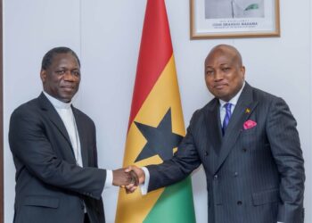 Ablakwa and Archbishop Kaboré shake hands at the Ministry of Foreign Affairs as Ghana moves to formalise its relationship with the Holy See.