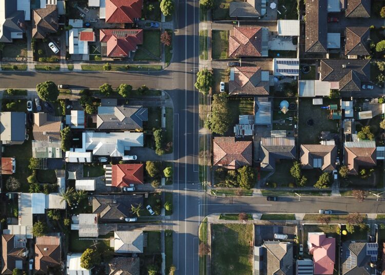 UN Calls for Urgent Action on Global Housing Crisis 1 A packed suburban housing development