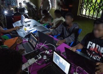 FBI Arrests 130 In Ghana Under Operation Blackout 4 FBI agents display devices seized during an Operation Blackout