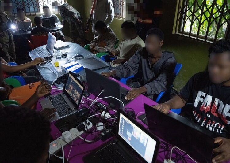 FBI Arrests 130 In Ghana Under Operation Blackout 1 FBI agents display devices seized during an Operation Blackout