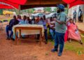DR. Peter Boamah Otukonor, Director of the Presidential Initiative in Agriculture and Agribusiness Engaging Farmers on the Dobidi Initiative in Dorma West