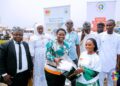 GEA Equips 242 Youth for Agribusiness 6 The Chief Executive Officer of Ghana, Enterprise Agency, Ms Margaret Ansei Distributing Equipment to Young People Within the Asokere Mampong in the Ashanti Region