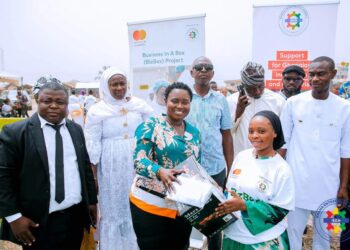 GEA Equips 242 Youth for Agribusiness 5 The Chief Executive Officer of Ghana, Enterprise Agency, Ms Margaret Ansei Distributing Equipment to Young People Within the Asokere Mampong in the Ashanti Region