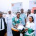 GEA Equips 242 Youth for Agribusiness 14 The Chief Executive Officer of Ghana, Enterprise Agency, Ms Margaret Ansei Distributing Equipment to Young People Within the Asokere Mampong in the Ashanti Region