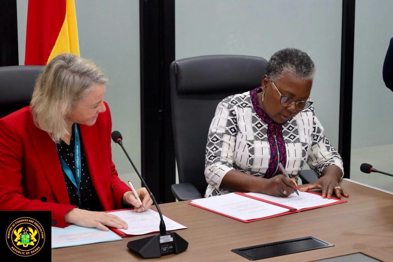 The Minister for Fisheries and Aquaculture, Hon. Emelia Arthur Signing the MoU ON Ghana.