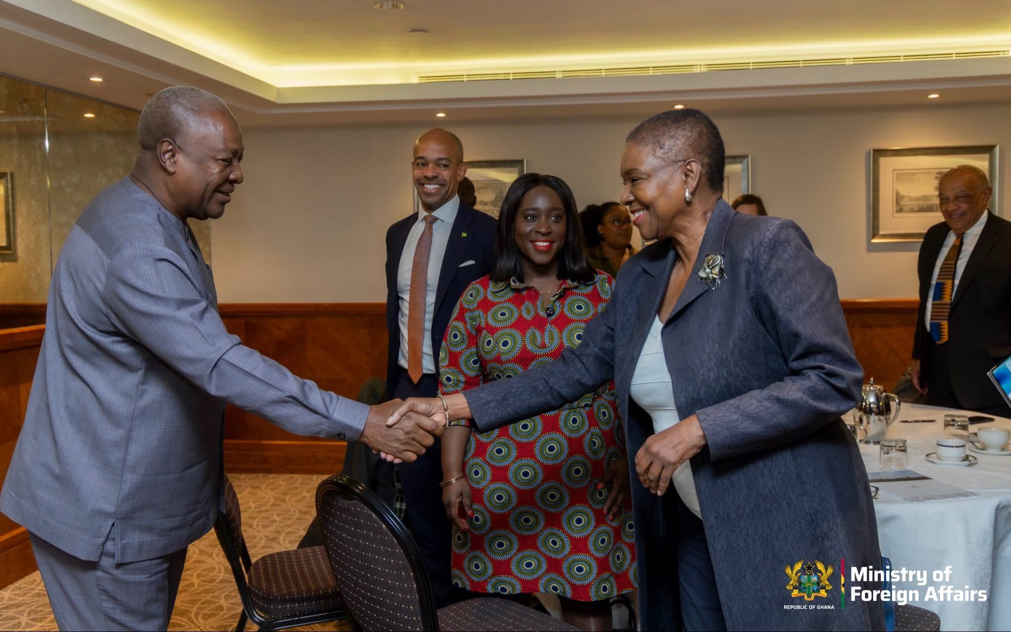 President John Dramani Mahama Exchanging Pleasantries with a High- Level Stakeholder