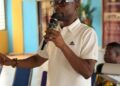 A Facilitator Engaging Cocoa Framers in the Volta and Oti Region About the New Cocoa Reforms