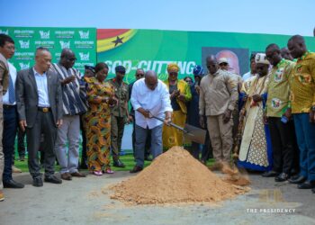 President Mahama breaks the ground for the 1,238 acre Afienya Industrial Park, with Trade Minister Elizabeth Ofosu-Adjare, Free Zones Authority CEO Dr. Mary Awusi, traditional leaders and officials looking on.