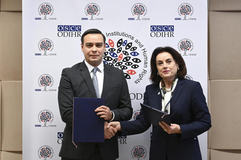 ODIHR Director Maria Telalian right and Kazakhstans Commissioner for Human Rights Artur Lastayev in Warsaw