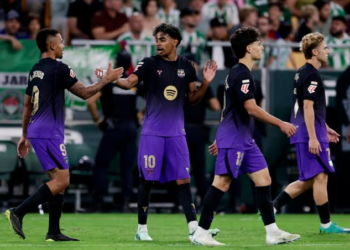 Barcelona Thump Betis to Extend Winning Streak to 11 Games 4 Barcelona players jubilate after scoring against Real Betis