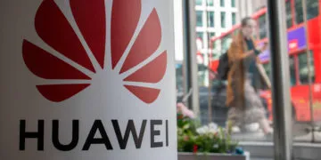 The British government conceded to growing US pressure and pledged Tuesday to remove Chinese telecoms giant Huawei from its 5G network by 2027