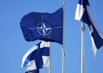 Finland Joins NATO 8 NATO flag, centre, and Finland flags flutter over the building of Ministry of Foreign Affairs in Helsinki, Finland, Tuesday, April 4, 2023.