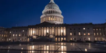 The Capitol is illuminated as the Senate works into the night to finish votes on amendments on the big debt ceiling and budget cuts package, at the Capitol in Washington, Thursday evening, June 1, 2023.