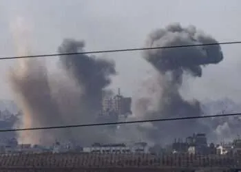 Smoke rises inside Gaza after an Israeli air strike.