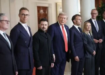 President Donald Trump and Ukrainian President Volodymyr Zelensky pose for a picture with European leaders following a meeting at the White House.