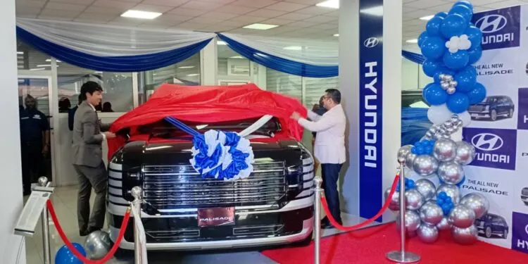 Shin Donghyun, Deputy Secretary and Consul at the Embassy of the Republic of Korea (L) and Mr. Ganesh Phadale, Country Director of Hyundai Motors & Investments Gh. Ltd (R) unveiling the 2026 Hyundai Palisade.